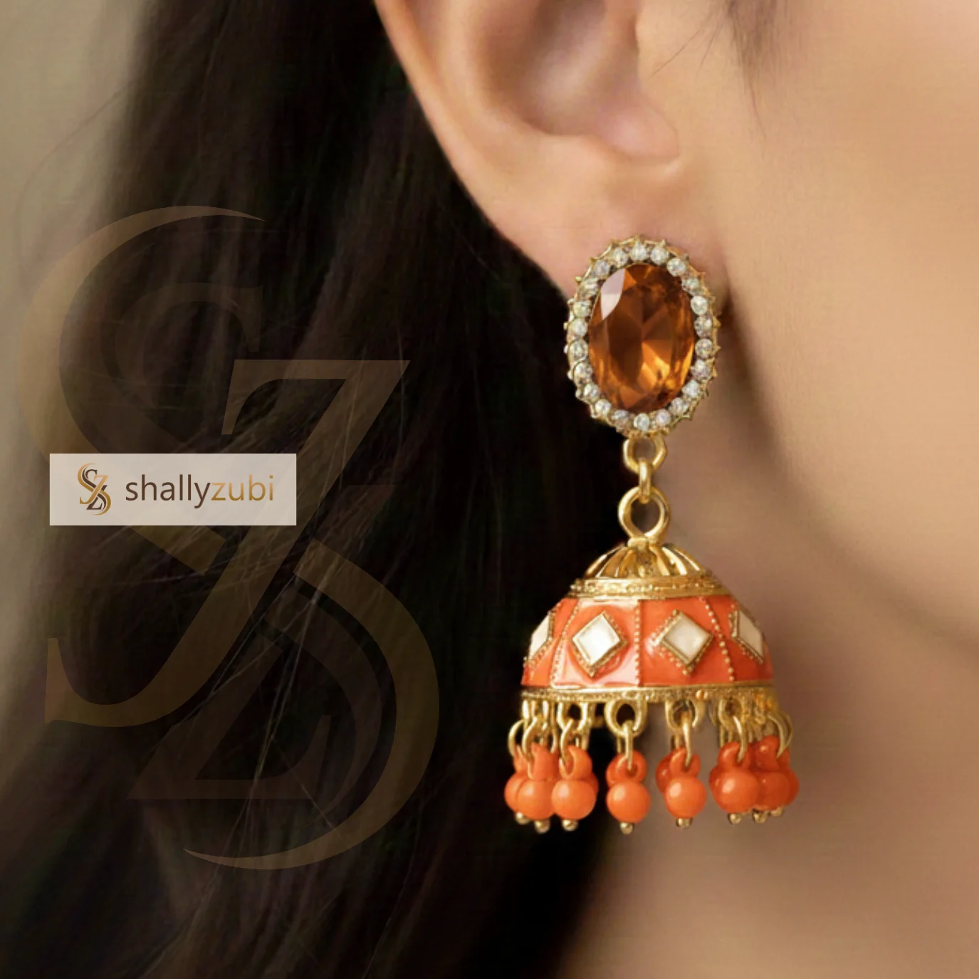 Orange colour Jhumka Earrings.