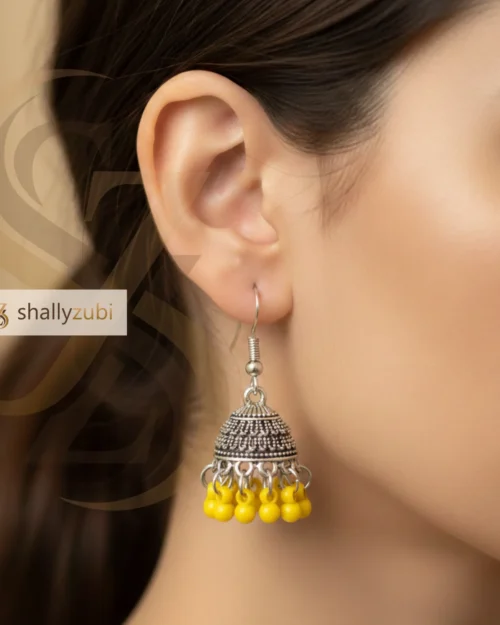 Traditional Oxidized silver jhumka earrings with yellow bead drops