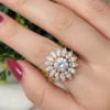 white floral sunburst Ring