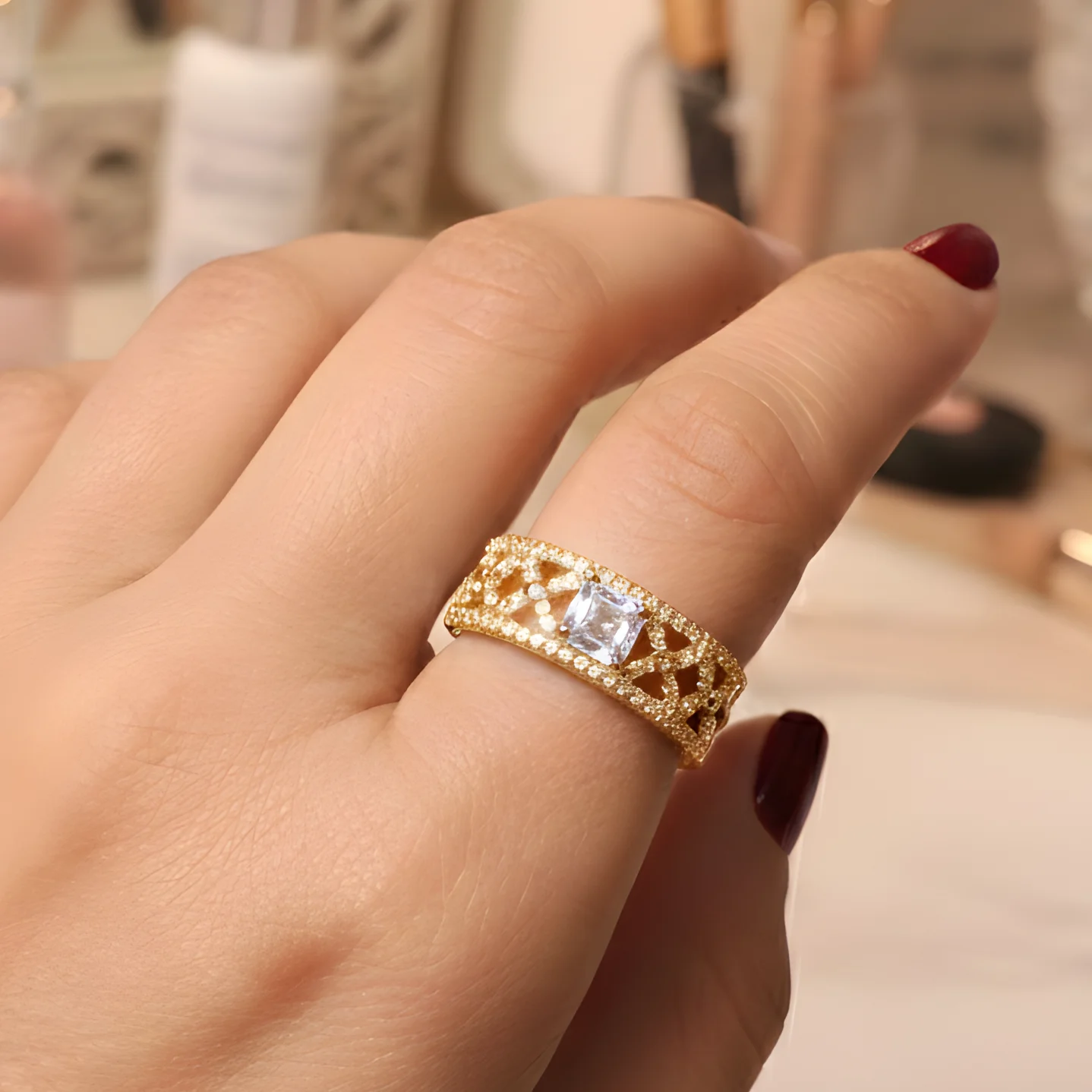 gold-plated anti-tarnish stainless steel clover-themed ring with a white center stone
