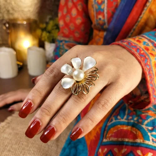 Gold-toned flower ring with central pearl
