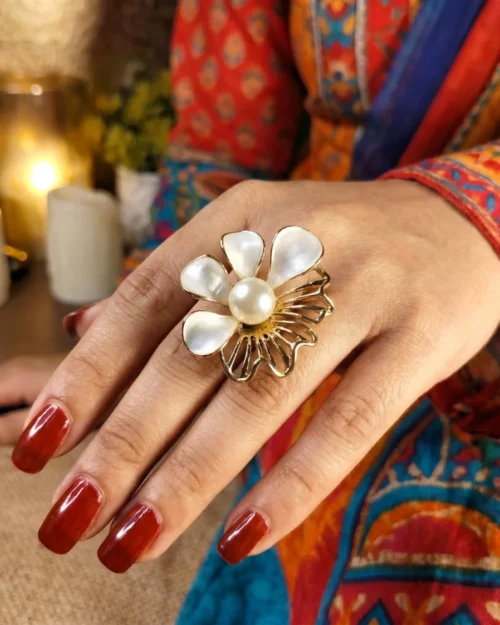 Gold-toned flower ring with central pearl