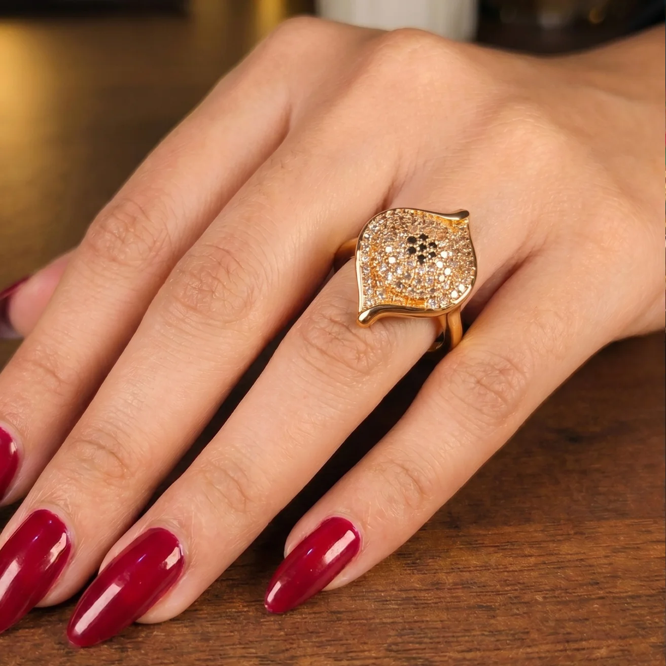 Sculptural wave with a Black center stone ring
