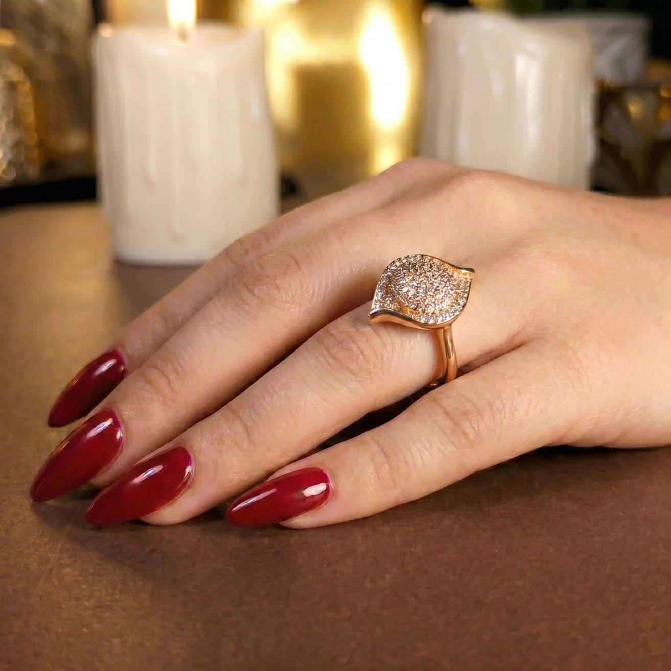 Sculptural wave with a white center stone ring