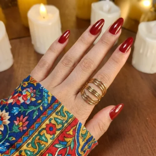 gold-toned, adjustable, open-band rings featuring a butterfly design and an interwoven waved design