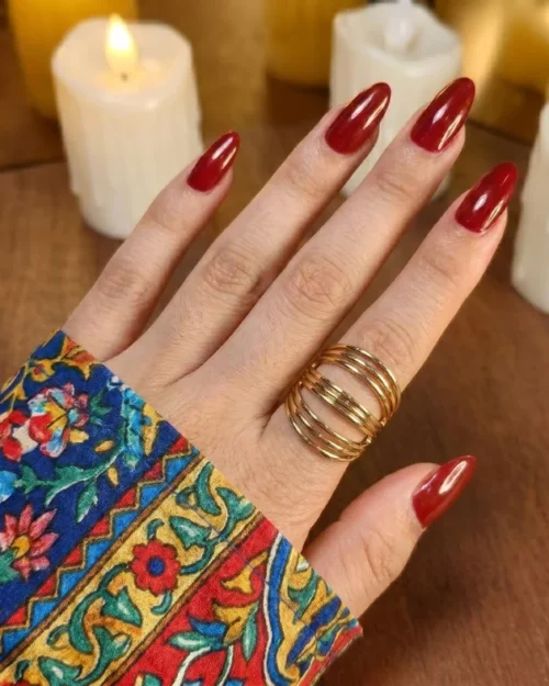 gold-toned, adjustable, open-band rings featuring a butterfly design and an interwoven waved design