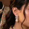 Untamed Petals drop pearl white and golden ear drop earrings