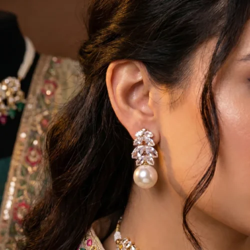 Untamed Petals drop pearl white and golden ear drop earrings