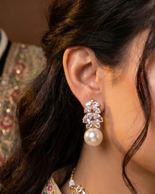 Untamed Petals drop pearl white and golden ear drop earrings