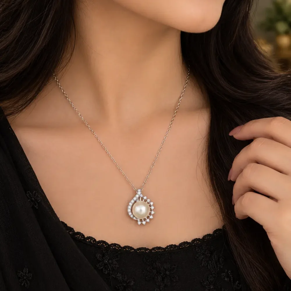 Pearl stainless steel pendant necklace with sparkling silver-tone detailing